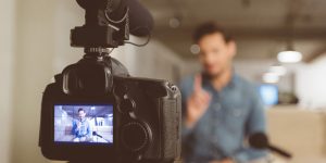 Male vlogger recording content for his vlog